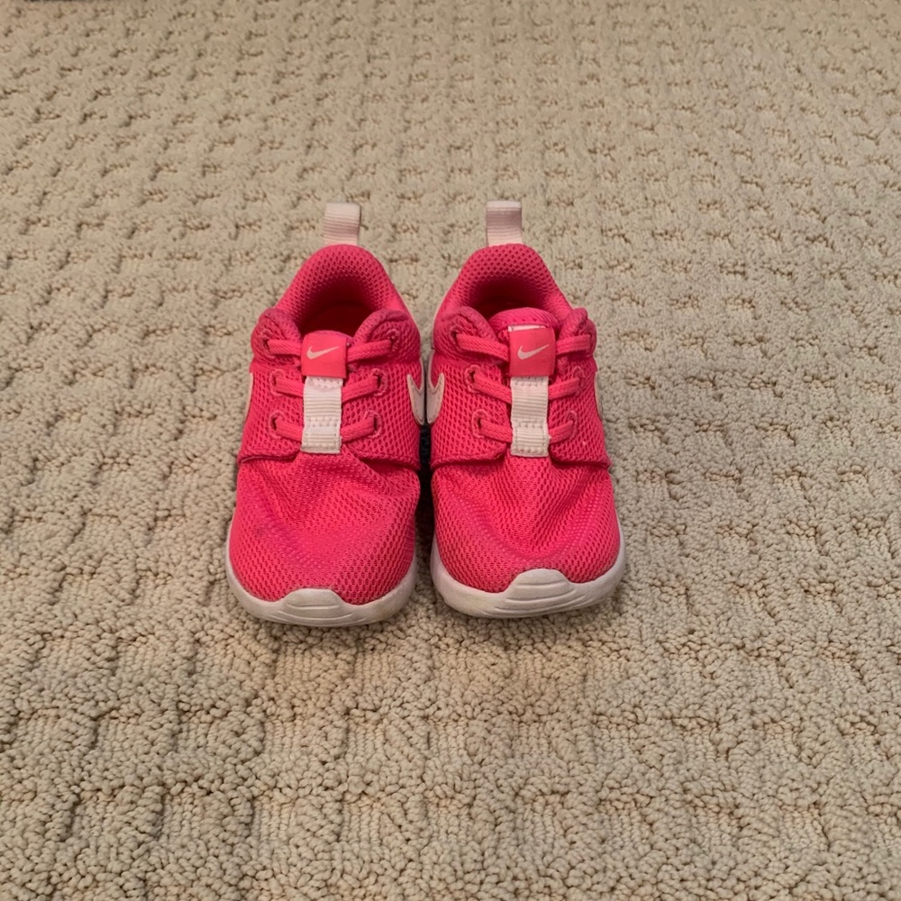 Hot pink toddler Nike athletic shoes
